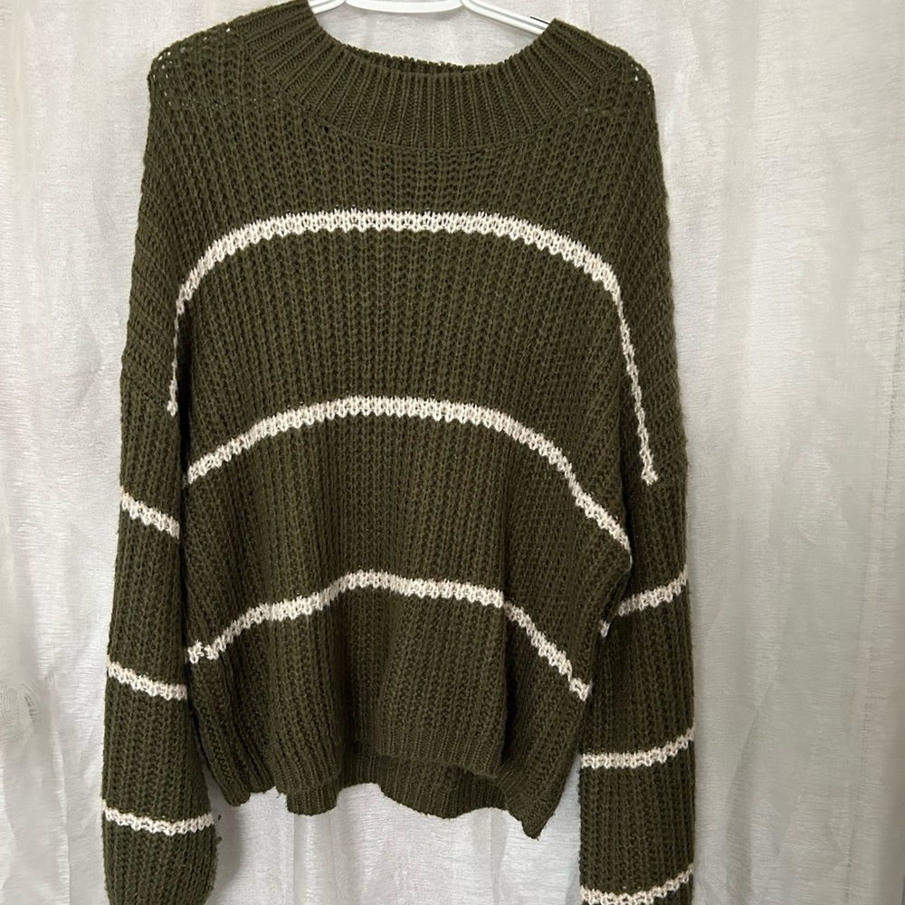 Green knit sweater with white strips